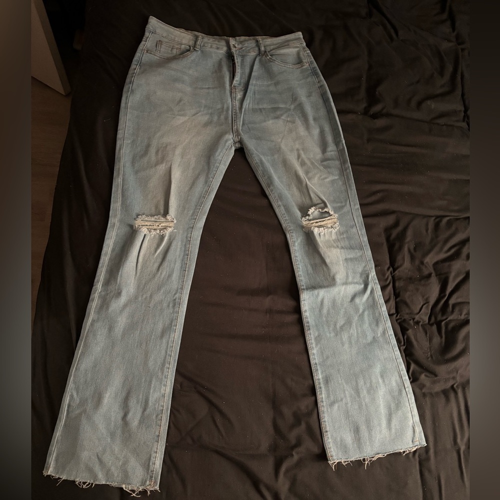 Women’s Distressed Fit & Flare Jeans